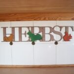 Herbst Motiv mit Schriftzug "HERBST" und verschiedenen niedlichen Eichhörnchen, Thanksgiving, Herbst Dekoration und Schmuck